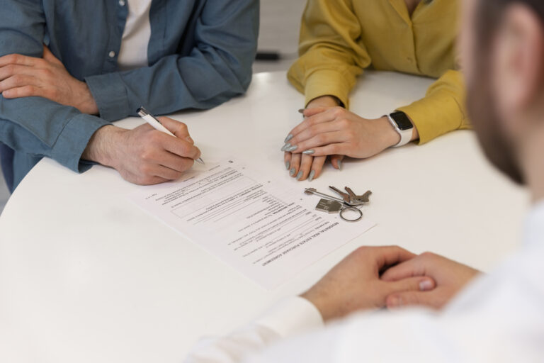 male-real-estate-agent-doing-business-showing-house-potential-buying-couple - G Construction